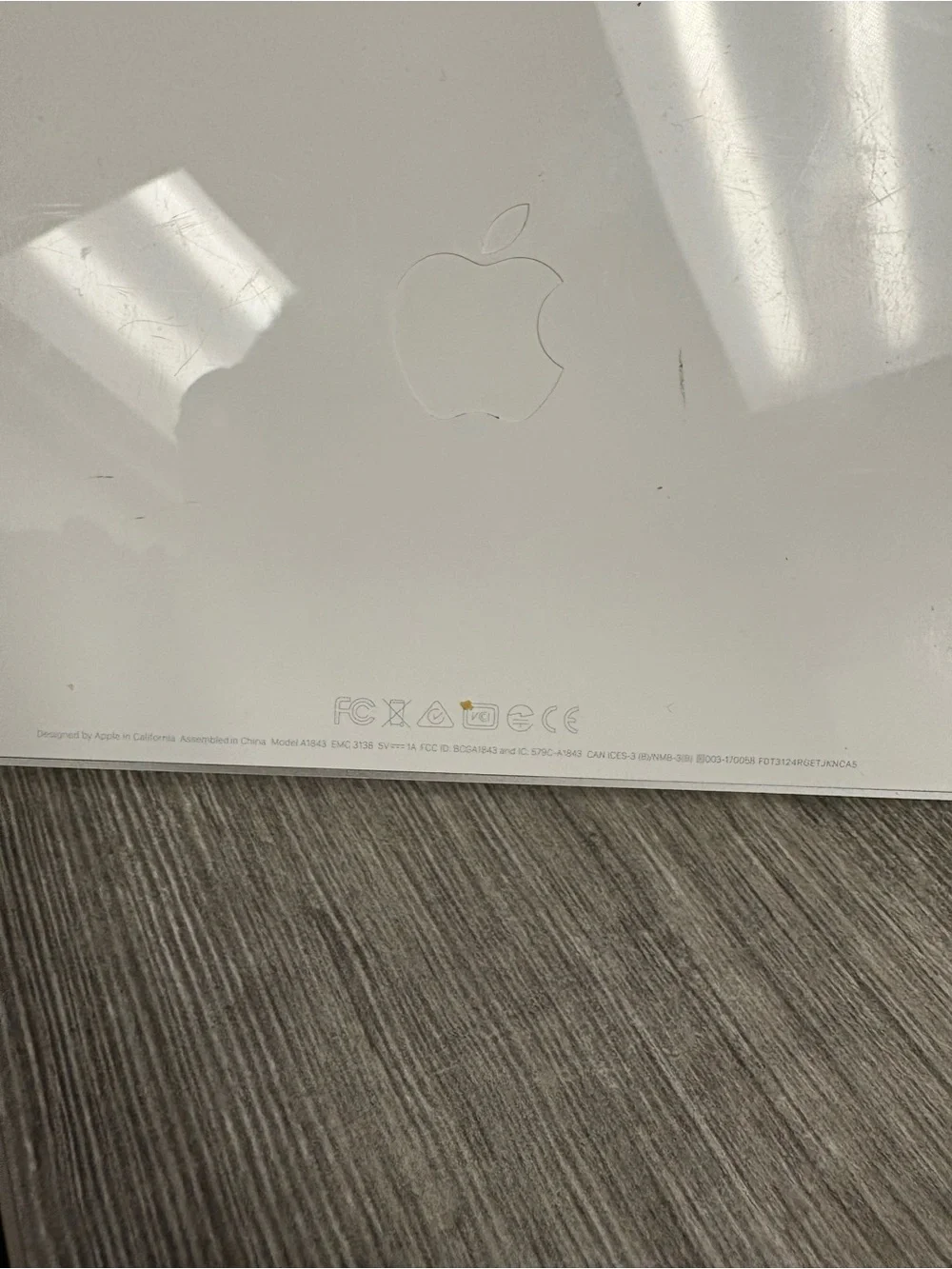 Apple Magic Keyboard in Silver and White lightning cable